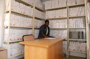 Research student, Idah Rikhotso in the file room at the Tswaka local research centre in Jouberton. Photo by Itumeleng Tau.